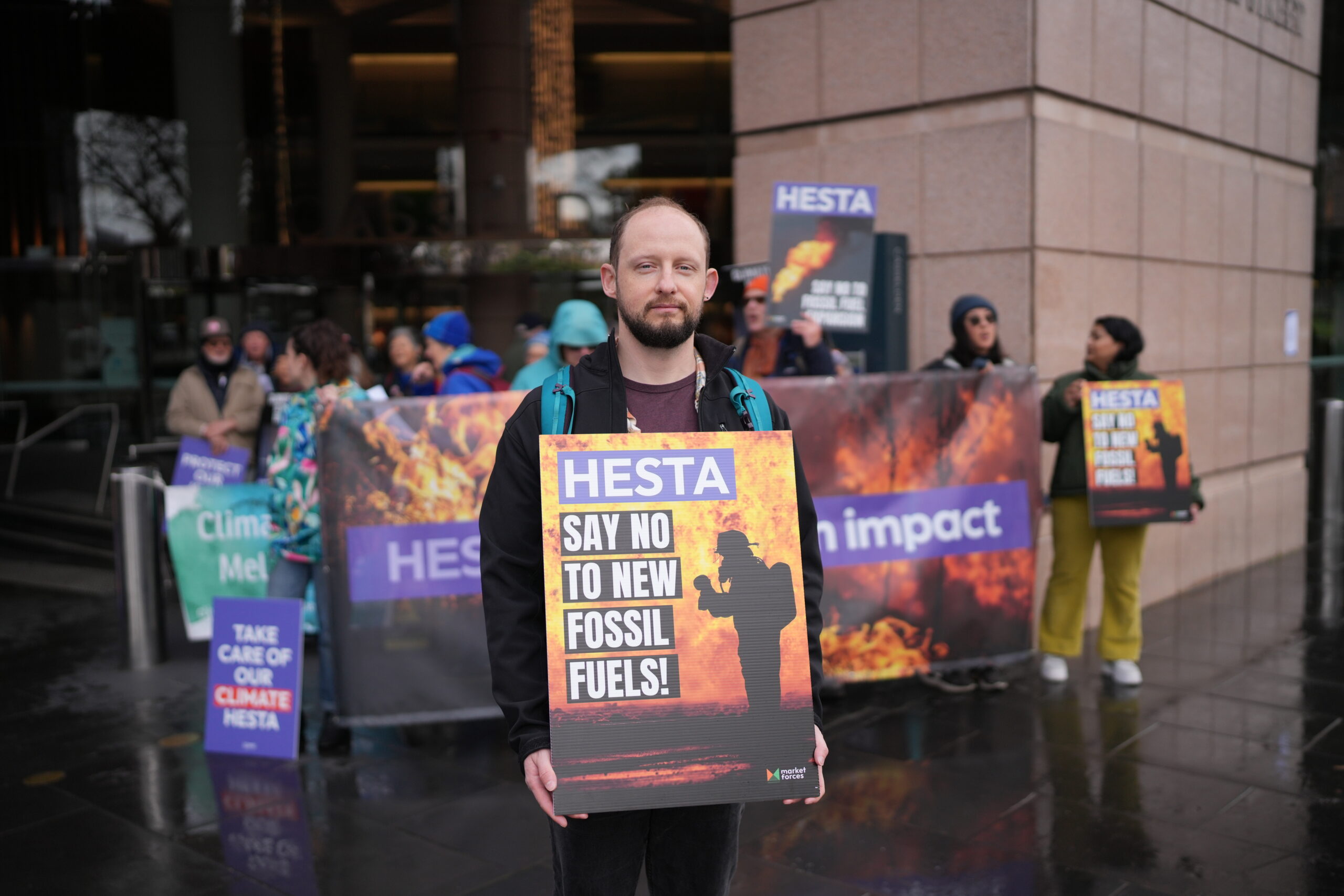 Rally attendees demanding HESTA says no to new fossil fuels.